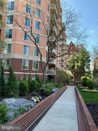 a view of a building with a yard