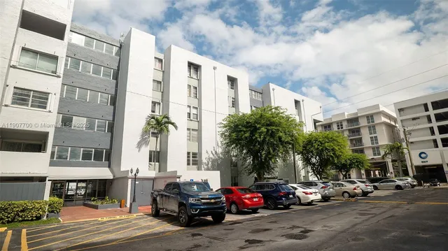 a cars parked in front of a building