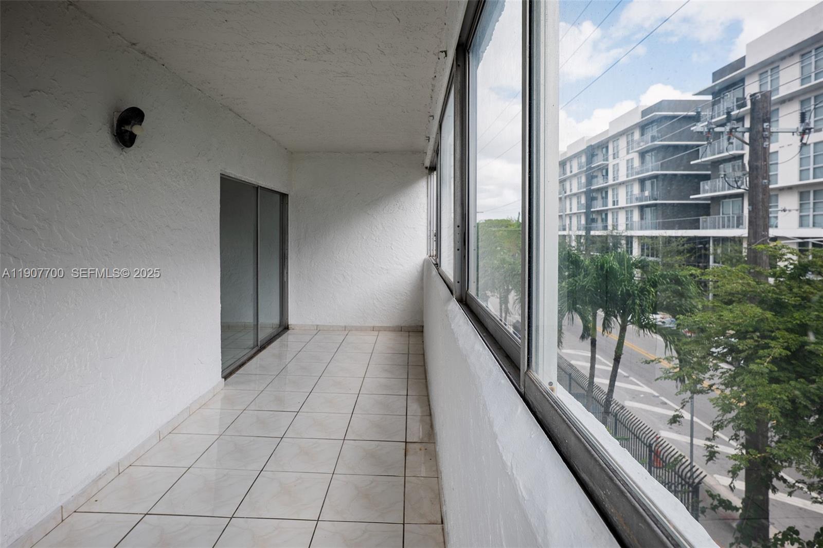 750 Northwest 43rd Avenue, Unit 308 Miami, FL 33126 - Photo 15 of 31 a view of a balcony