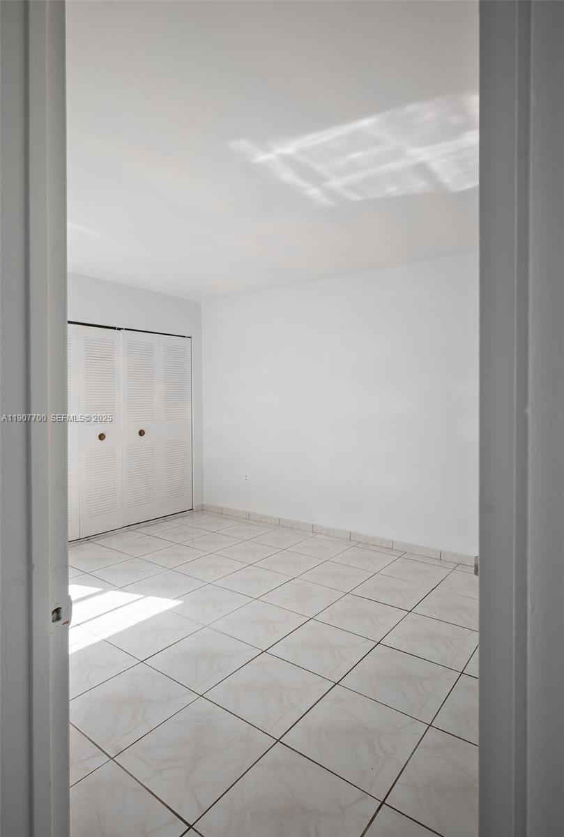 750 Northwest 43rd Avenue, Unit 308 Miami, FL 33126 - Photo 27 of 31 a view of an empty room