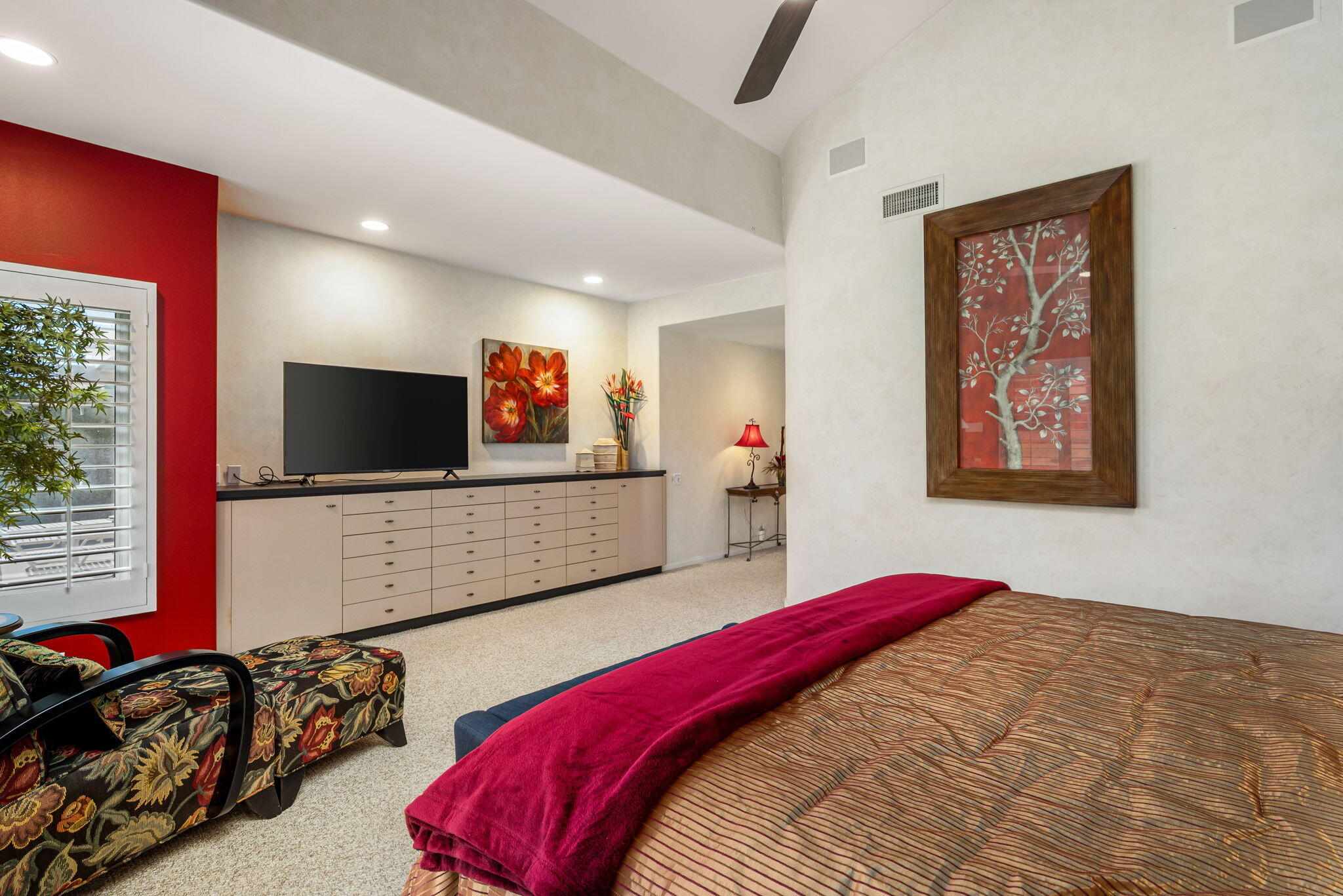 75395 Riviera Drive Indian Wells, CA 92210 - Photo 15 of 35 a bedroom with a bed and a flat screen tv