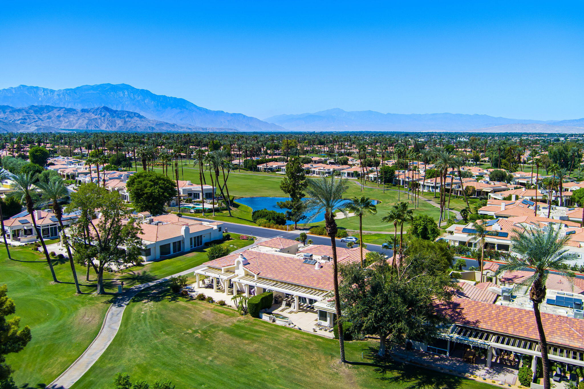 75395 Riviera Drive Indian Wells, CA 92210 - Photo 32 of 35 a view of a city with mountains in the background