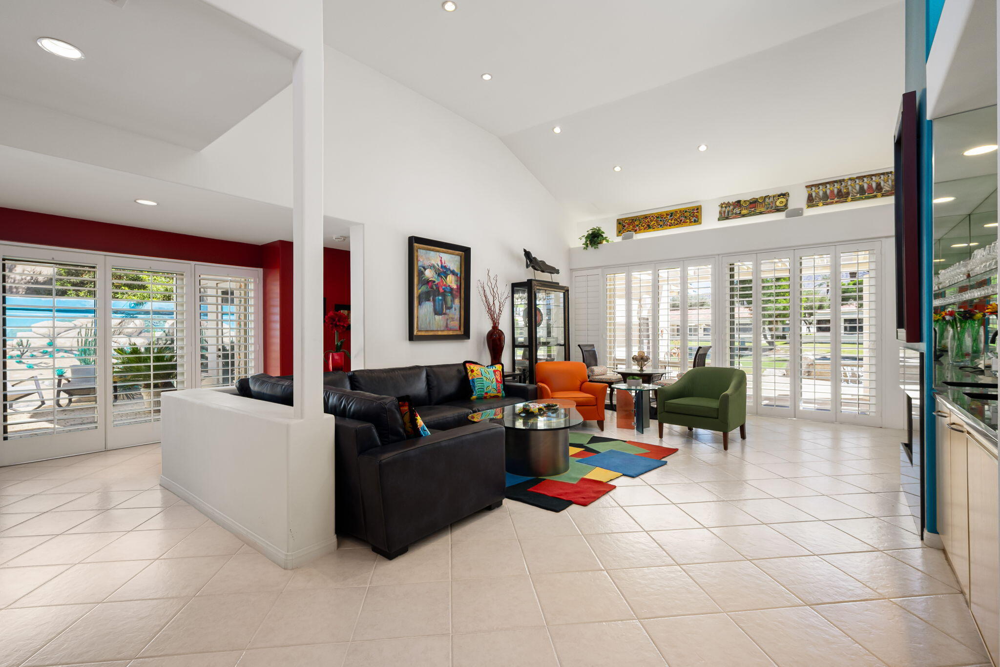 75395 Riviera Drive Indian Wells, CA 92210 - Photo 4 of 35 a living room with fireplace furniture and floor to ceiling window