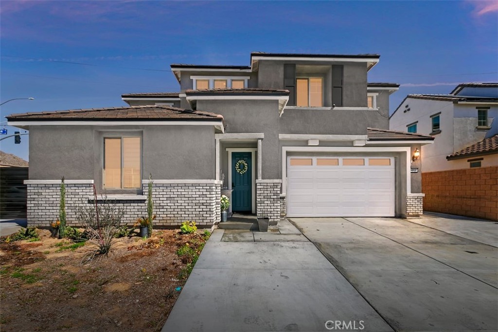 4521 Highland Avenue Perris, CA 92571 - Photo 1 of 54 front view of a house