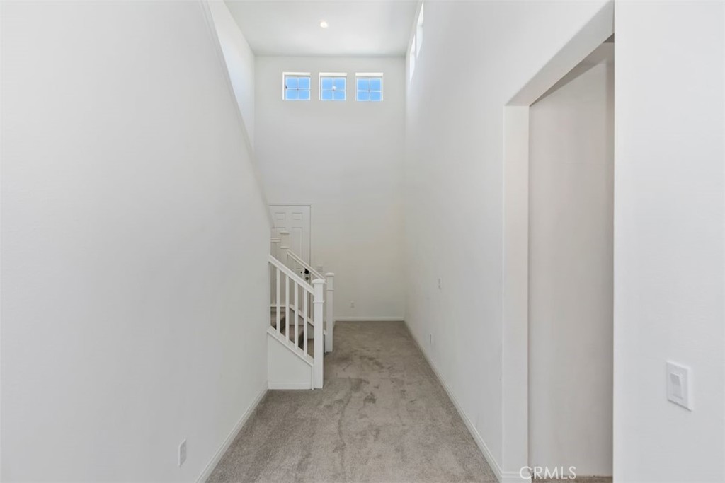 4521 Highland Avenue Perris, CA 92571 - Photo 11 of 54 a view of hallway with window