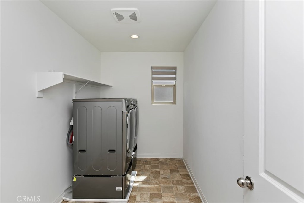 4521 Highland Avenue Perris, CA 92571 - Photo 24 of 54 a bathroom with a shower and a toilet