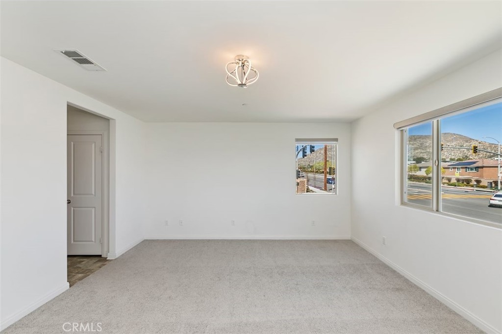 4521 Highland Avenue Perris, CA 92571 - Photo 33 of 54 a view of an empty room with a window