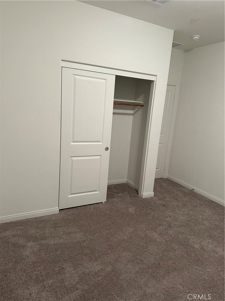 4521 Highland Avenue Perris, CA 92571 - Photo 47 of 54 an empty room with closet area