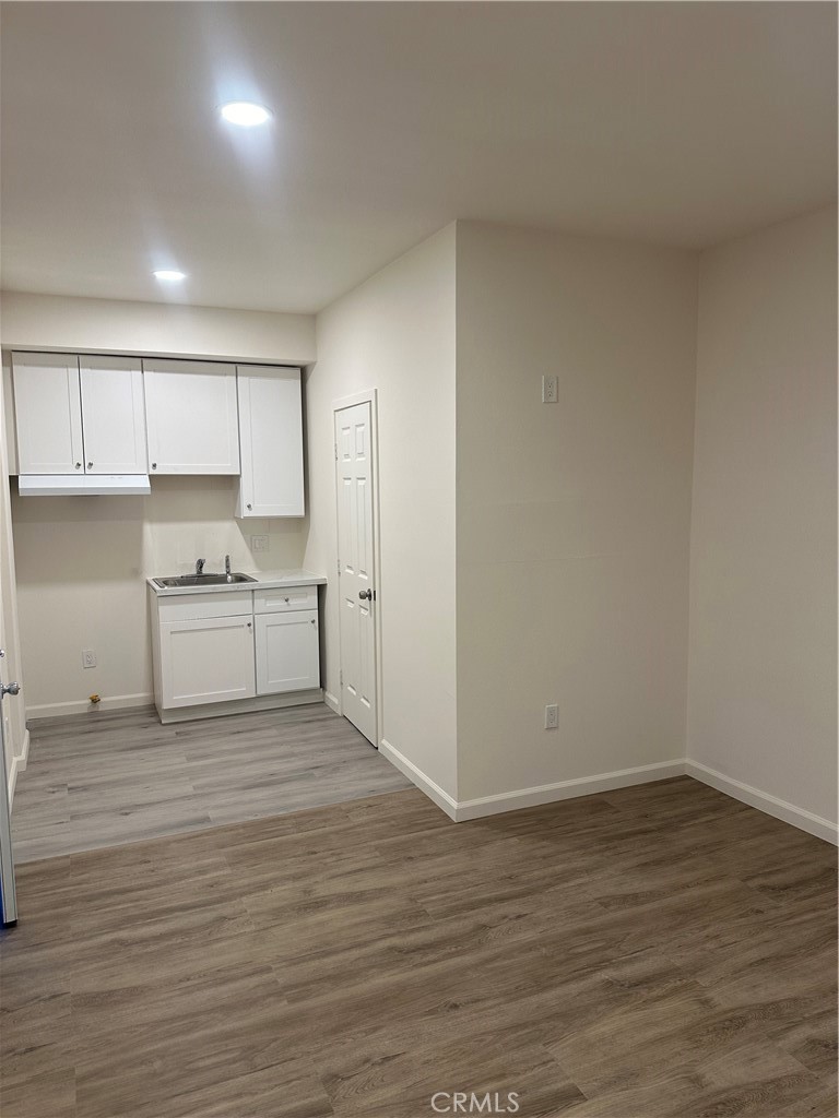 4521 Highland Avenue Perris, CA 92571 - Photo 50 of 54 a view of a kitchen with wooden floor