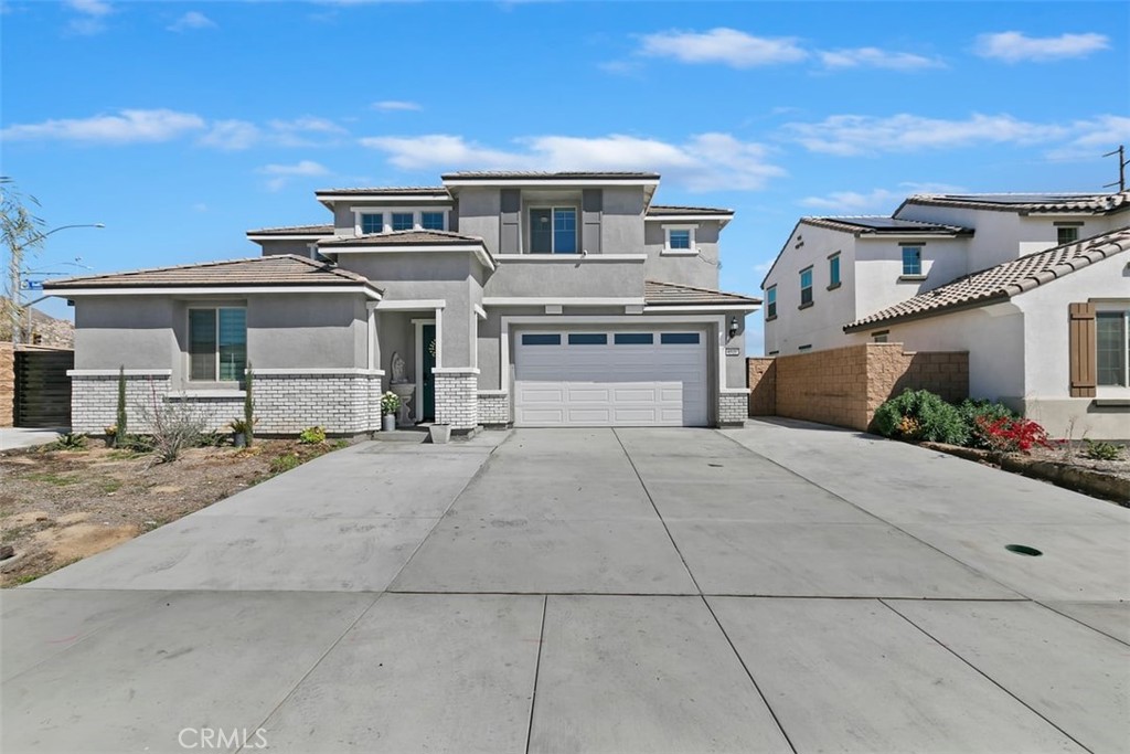 4521 Highland Avenue Perris, CA 92571 - Photo 5 of 54 a view of a house with a yard