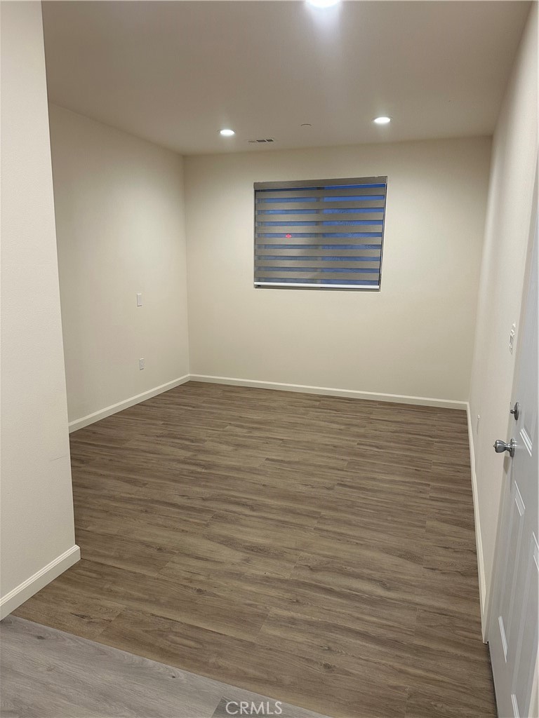 4521 Highland Avenue Perris, CA 92571 - Photo 51 of 54 wooden floor in an empty room