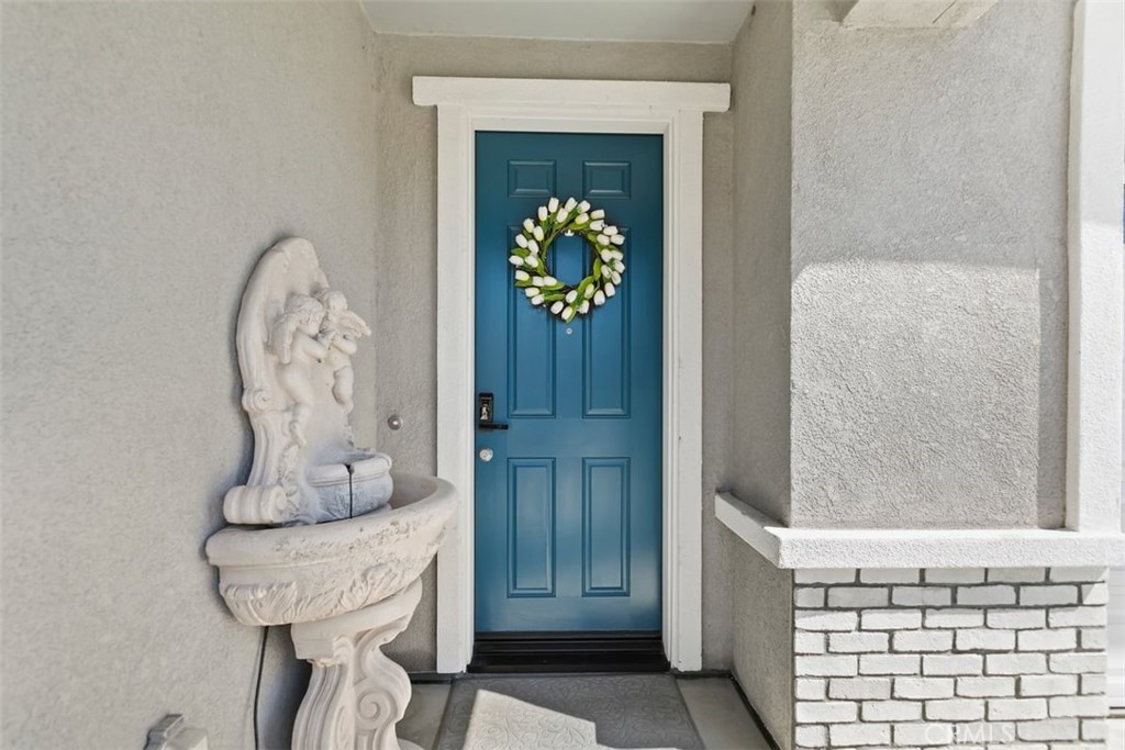 4521 Highland Avenue Perris, CA 92571 - Photo 9 of 54 a room with painting and a table