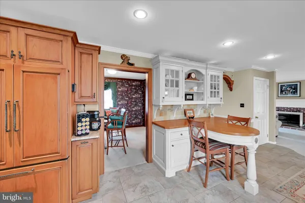a view of a workspace and kitchen