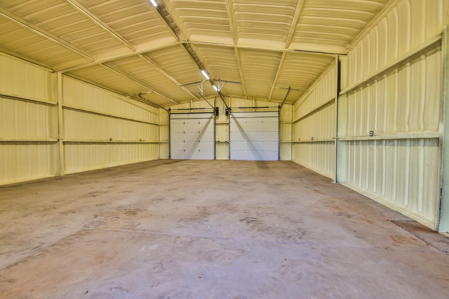 1392 Redhead Road New Home, TX 79381 - Photo 25 of 32 Attached, Insulated 30x50 Garage