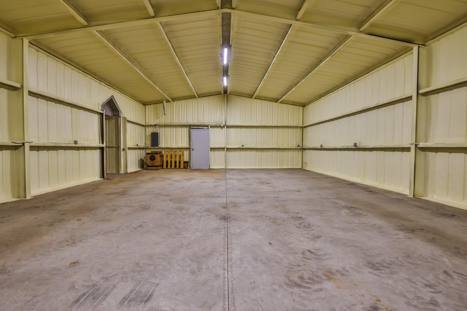 1392 Redhead Road New Home, TX 79381 - Photo 26 of 32 Attached, Insulated 30x50 Garage