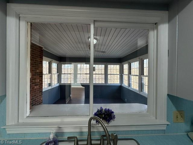 154 East Manor Ridge Road Elkin, NC 28621 - Photo 22 of 34 Pass through window from kitchen to sun room
