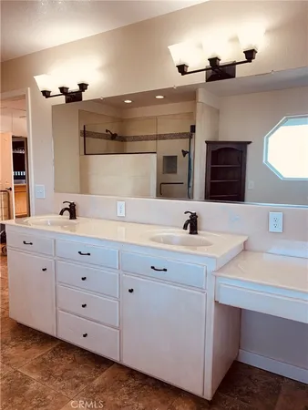 a view of a swimming pool with an outdoor space and seating area