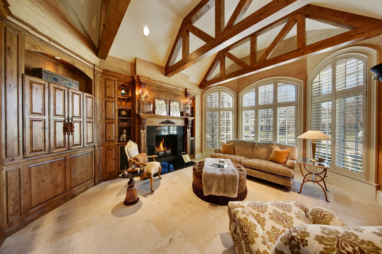 909 Cleveland Road Hinsdale, IL 60521 - Photo 4 of 30 a view of a livingroom with furniture and a fireplace