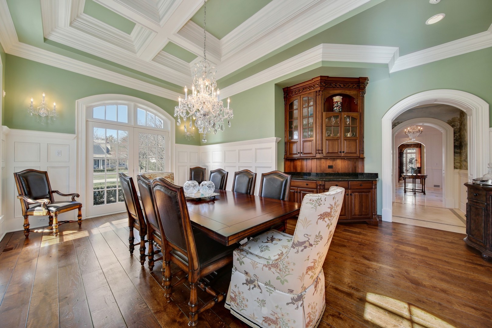 909 Cleveland Road Hinsdale, IL 60521 - Photo 5 of 30 a view of a dining room with furniture wooden floor and chandelier
