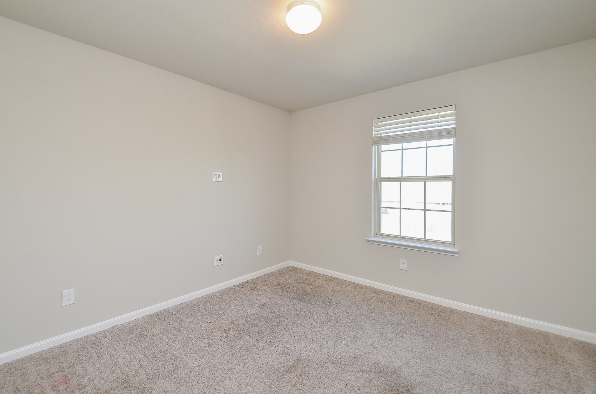 4015 Prairie Landing Lane Katy, TX 77494 - Photo 25 of 32 an empty room with a window
