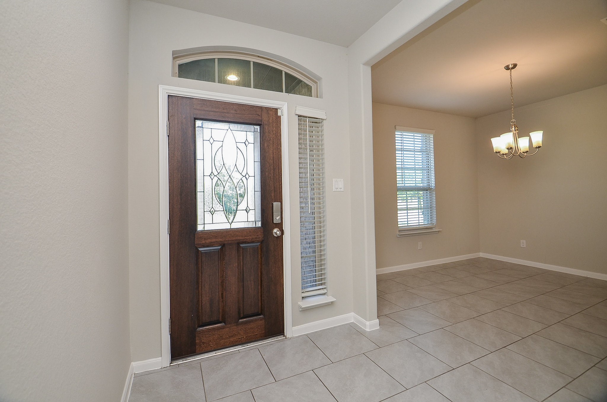 4015 Prairie Landing Lane Katy, TX 77494 - Photo 31 of 32 an empty room with windows cabinet and mirror