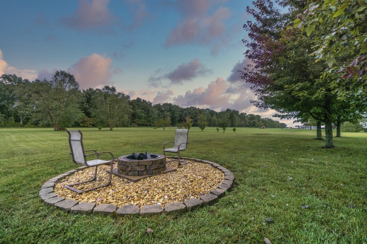 372 Bell Road Morrison, TN 37357 - Photo 8 of 46 a view of a swimming pool with a yard