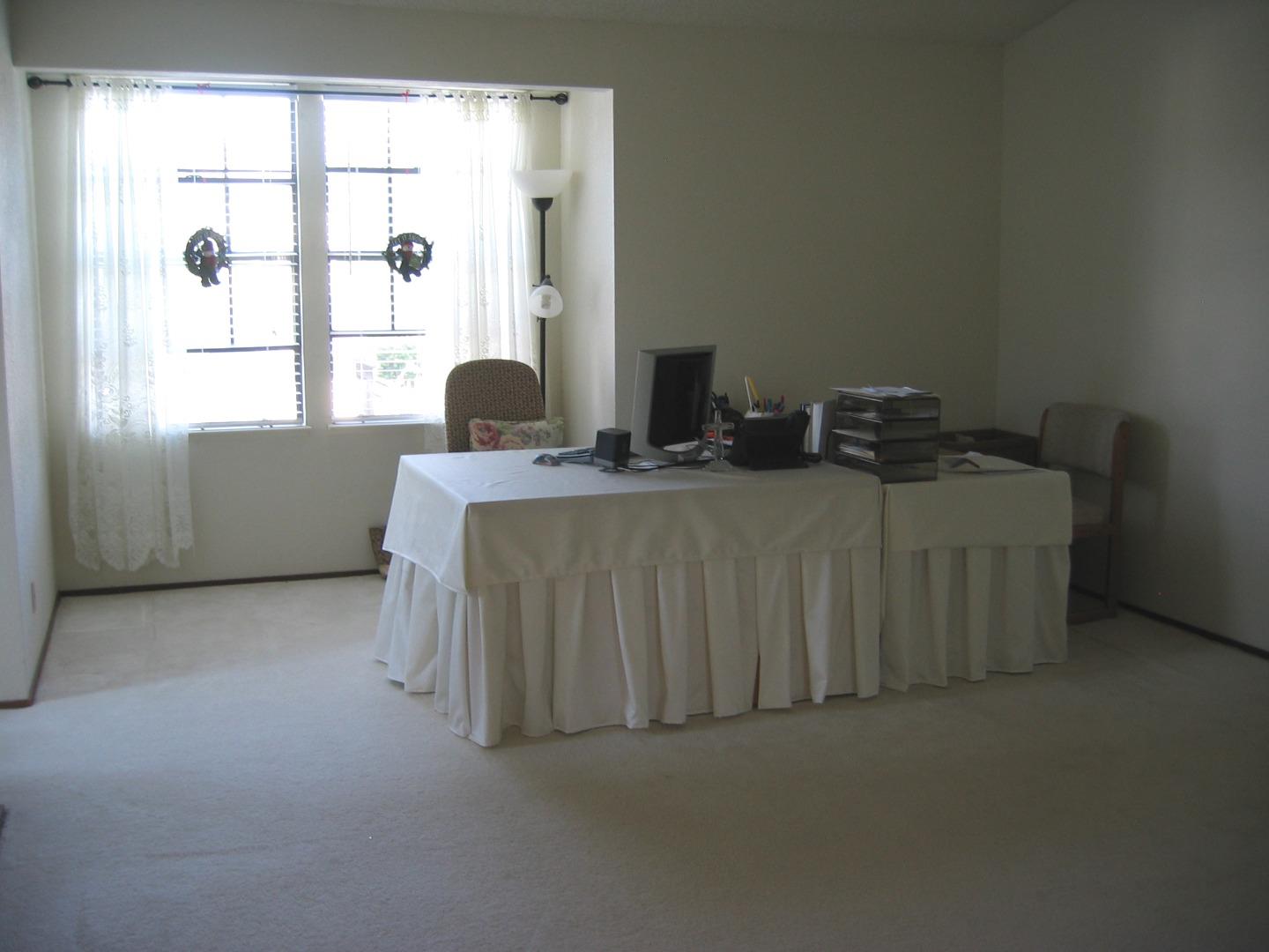 752 Superior Road Milpitas, CA 95035 - Photo 12 of 14 a bedroom with a bed and a large window
