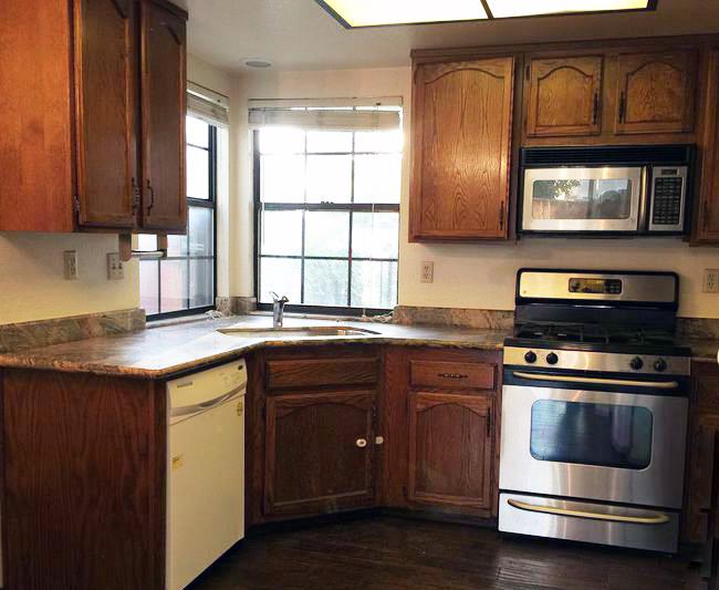 752 Superior Road Milpitas, CA 95035 - Photo 4 of 14 a kitchen with stainless steel appliances granite countertop a stove and a microwave