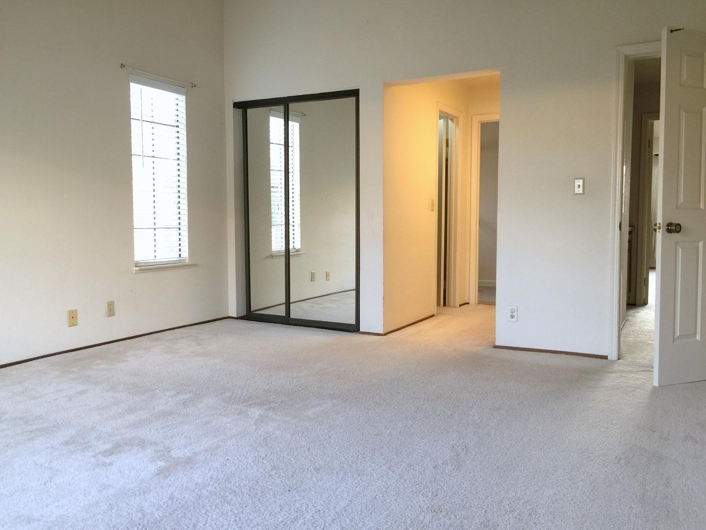 752 Superior Road Milpitas, CA 95035 - Photo 9 of 14 an empty room with windows and closet