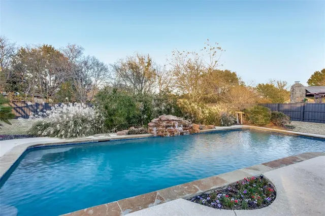a view of a swimming pool with an outdoor space