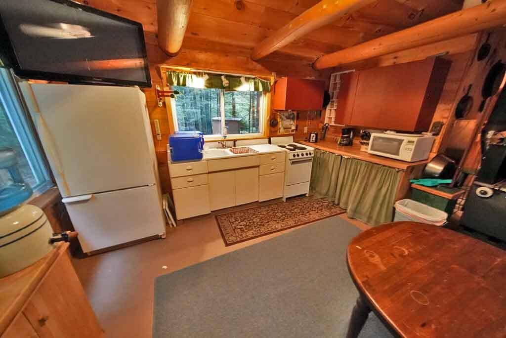 643 Sandy Beach Road Danforth, ME 04424 - Photo 13 of 48 kitchen-dining-area-lake-ca