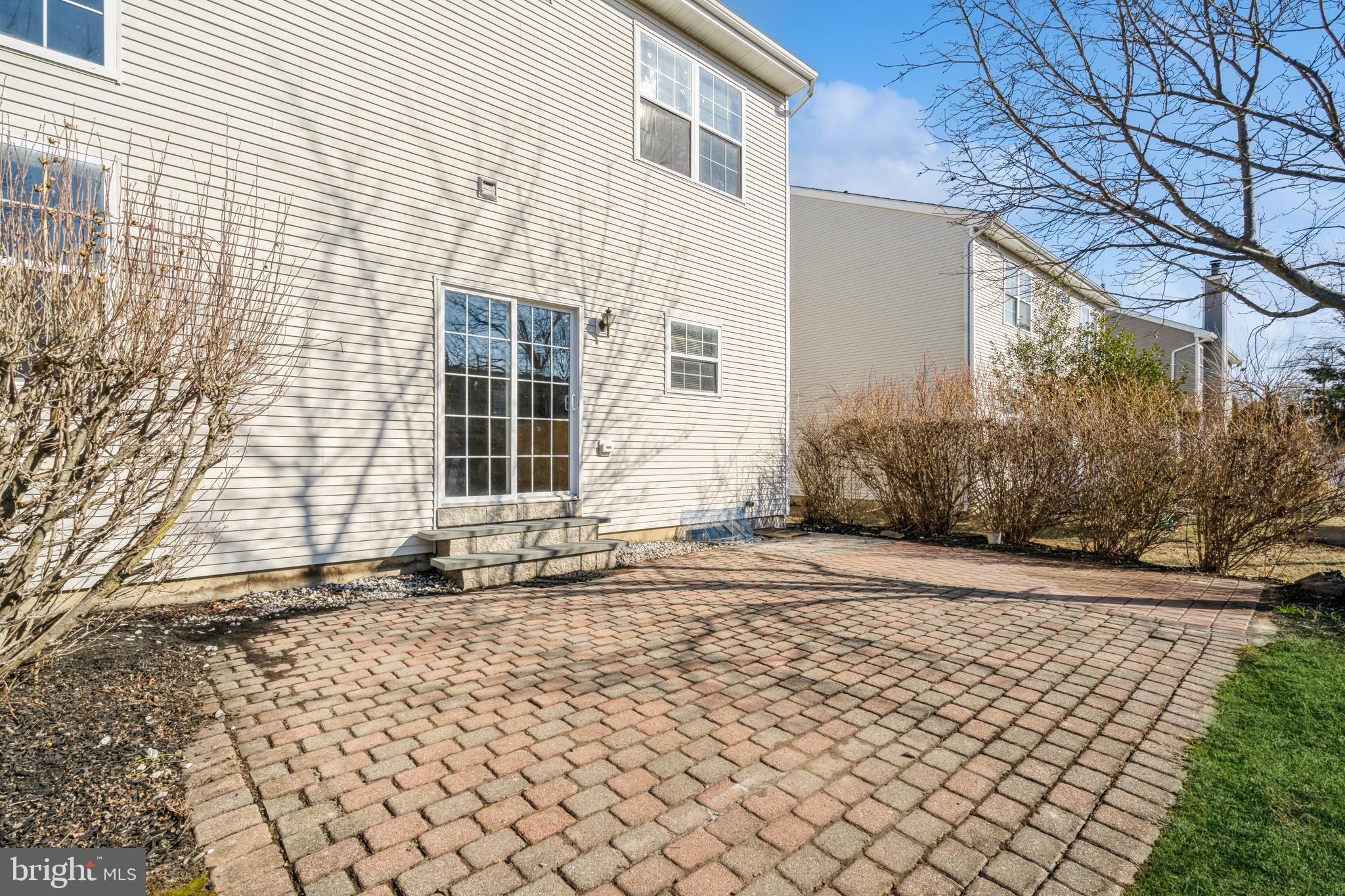 26 Manley Road Pennington, NJ 08534 - Photo 38 of 38 a front view of a house with a yard