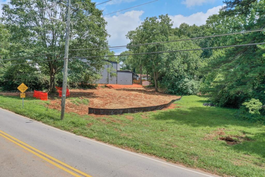 1493 Frazier Road Decatur, GA 30033 - Photo 1 of 1 a view of a backyard with palm trees
