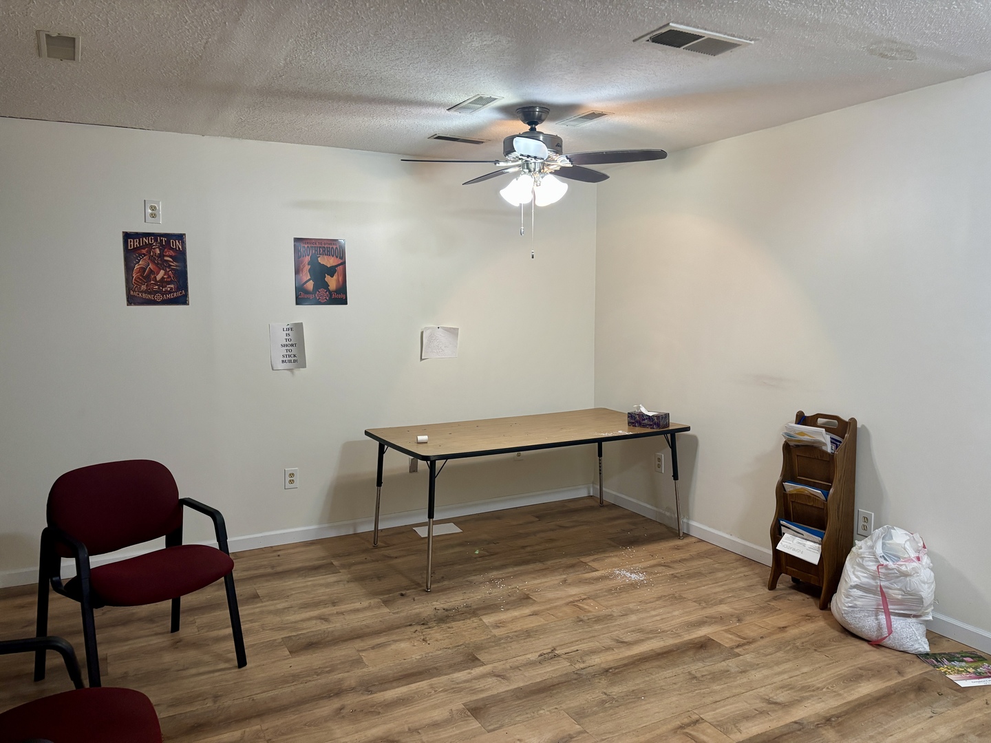 922 Highway 49 Casey, IL 62420 - Photo 12 of 28 a view of a workspace with furniture and wooden floor