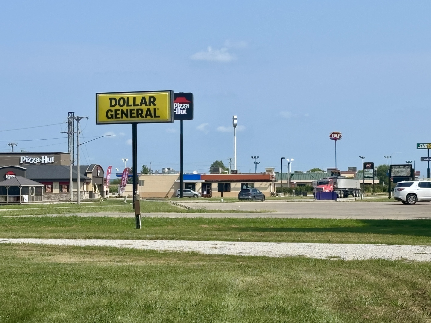 922 Highway 49 Casey, IL 62420 - Photo 28 of 28 a sign board with a play ground in the back