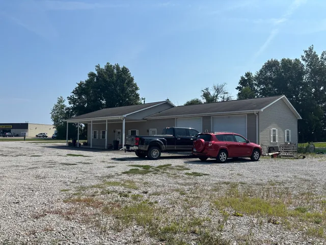 a view of a car is parked in front of house