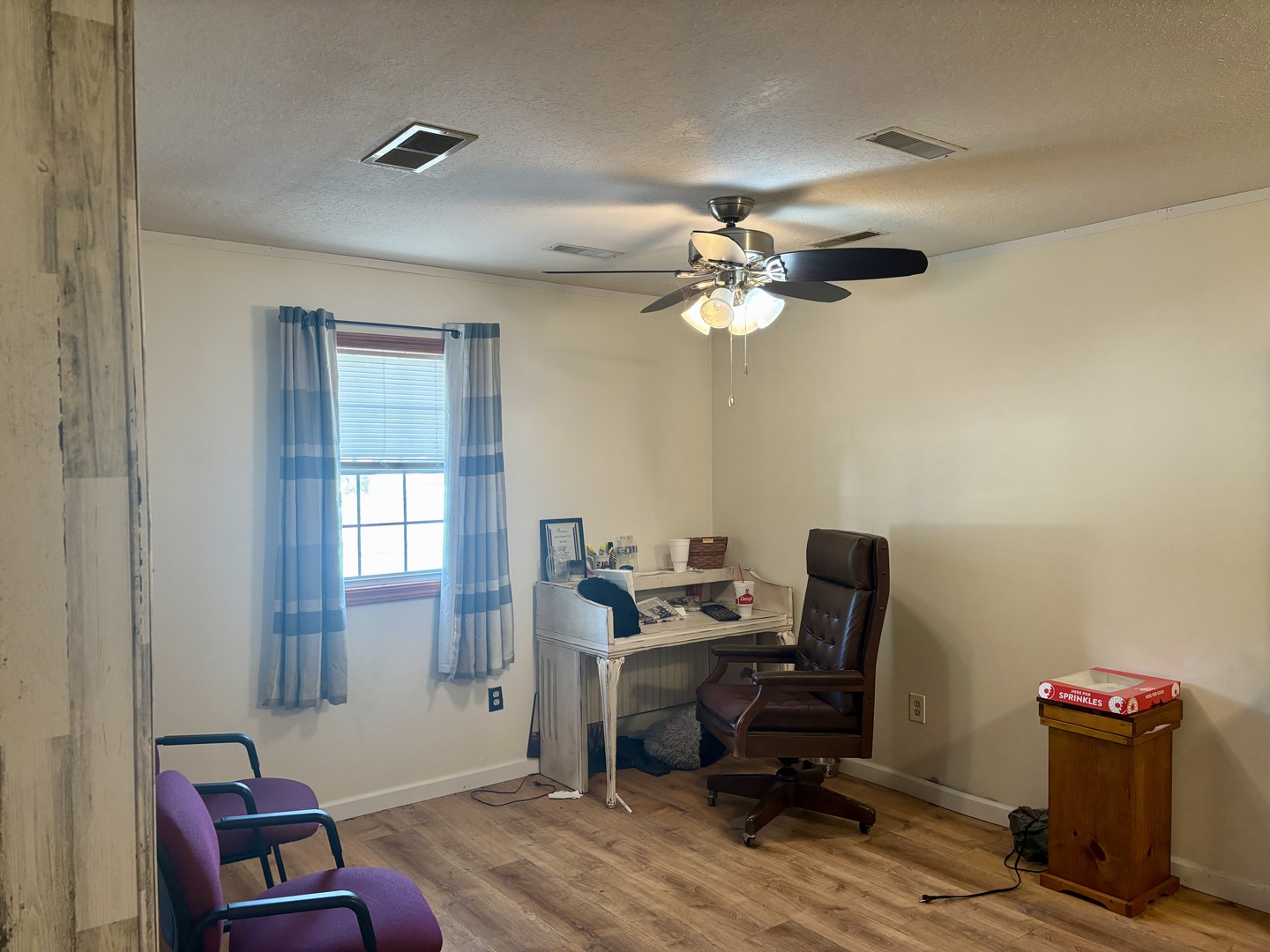 922 Highway 49 Casey, IL 62420 - Photo 8 of 28 a view of a workspace with furniture and a window