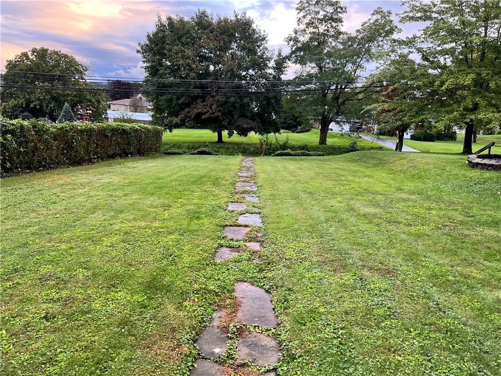 124 Pine Hill Road Kittanning, PA 16201 - Photo 2 of 20 a backyard of a house with lots of green space