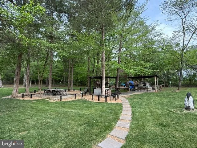 a view of a park with swings and slides