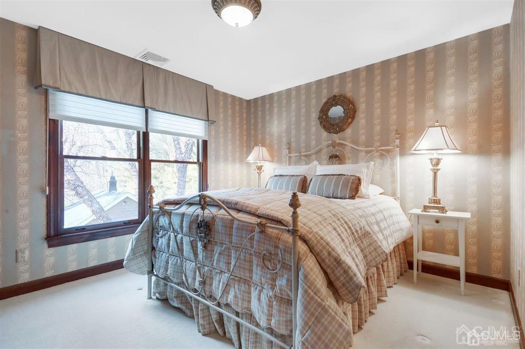 270 Springhill Road Skillman, NJ 08558 - Photo 18 of 27 a bedroom with a bed and a window