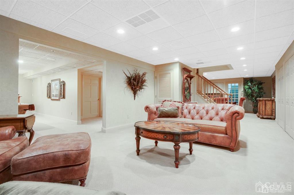 270 Springhill Road Skillman, NJ 08558 - Photo 21 of 27 a living room with furniture and a wooden floor