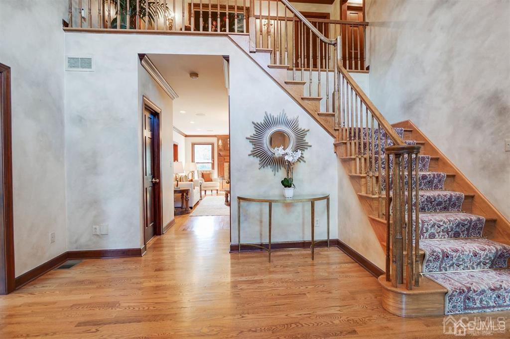 270 Springhill Road Skillman, NJ 08558 - Photo 4 of 27 a view of entryway and hall with wooden floor