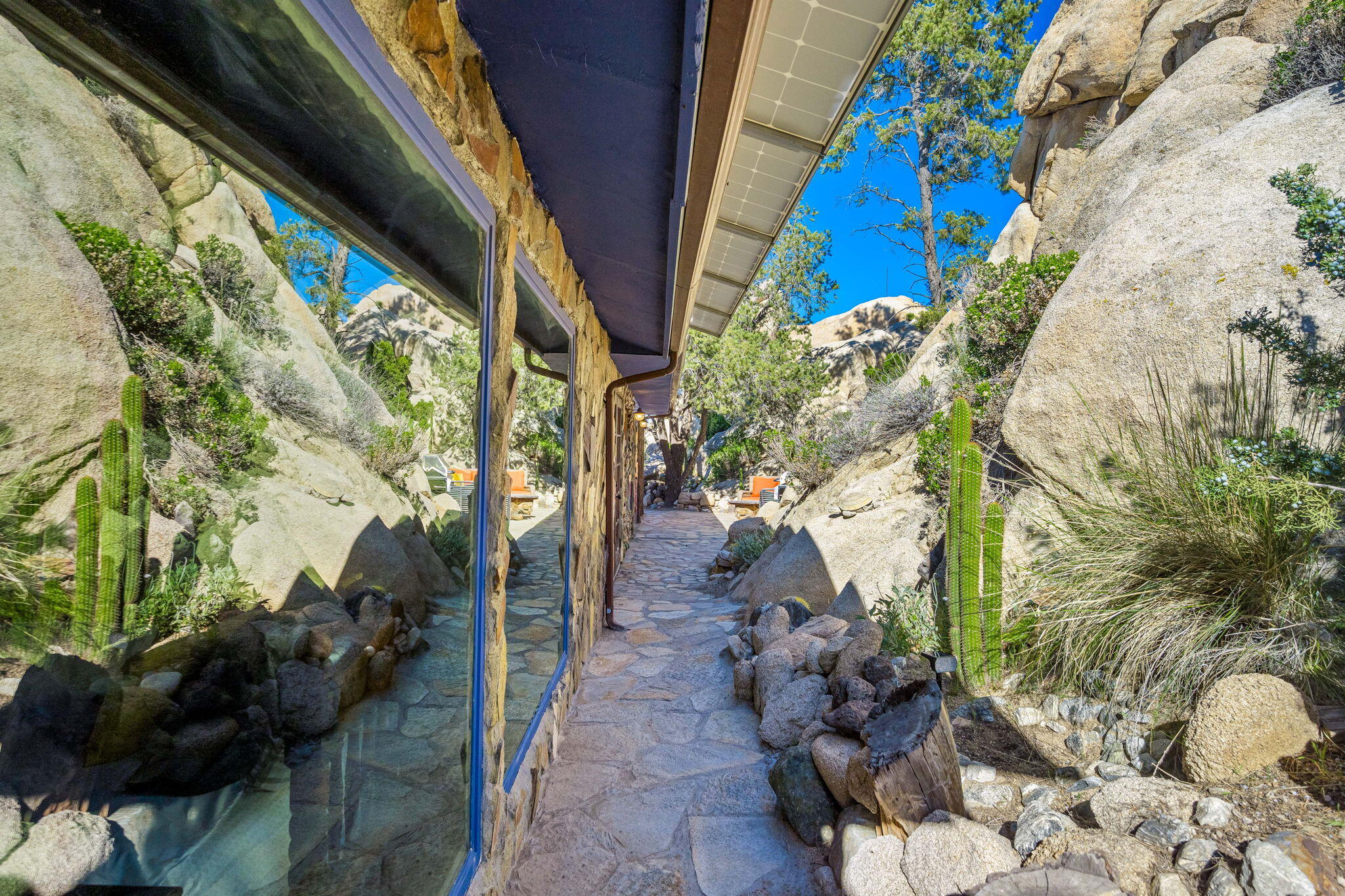 5845 Cholla Avenue Yucca Valley, CA 92284 - Photo 26 of 75 a view of path along with potted plants