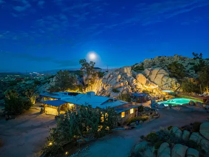 a view of a chairs and tables in patio