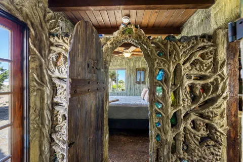 a view of a living room and a wooden floor