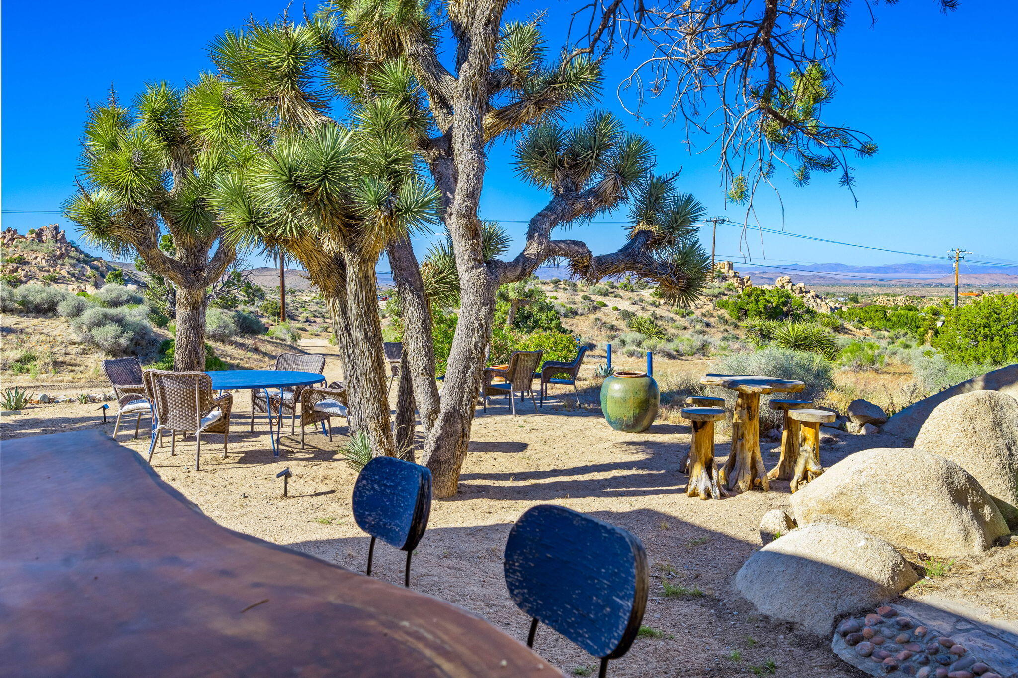 5845 Cholla Avenue Yucca Valley, CA 92284 - Photo 9 of 75 a view of a swimming pool with a patio