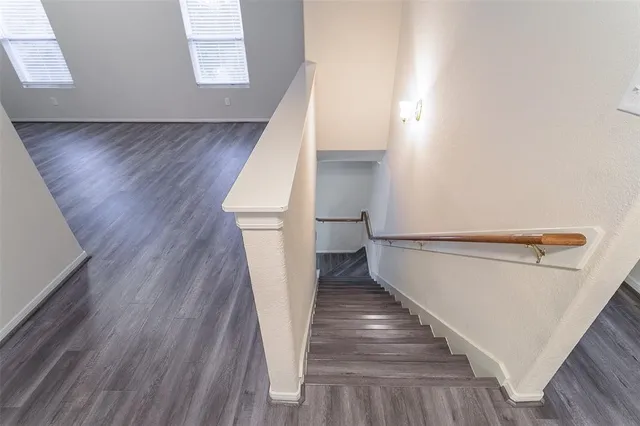 a view of entryway with wooden floor