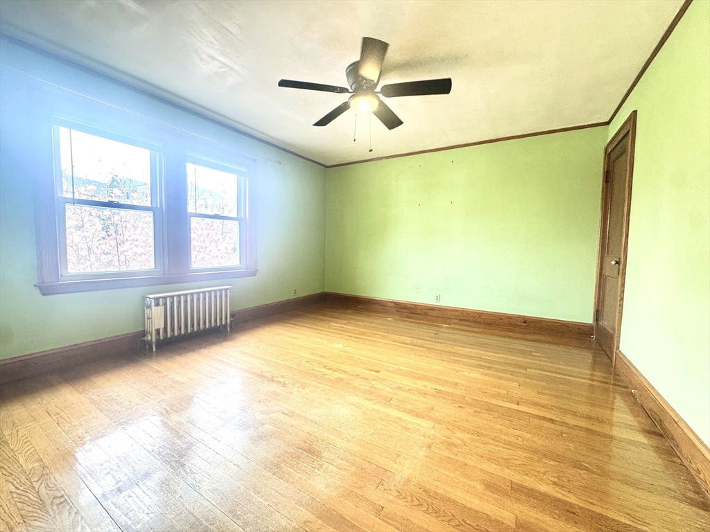 53 Breck Avenue Boston, MA 02135 - Photo 17 of 35 a view of an empty room with a window