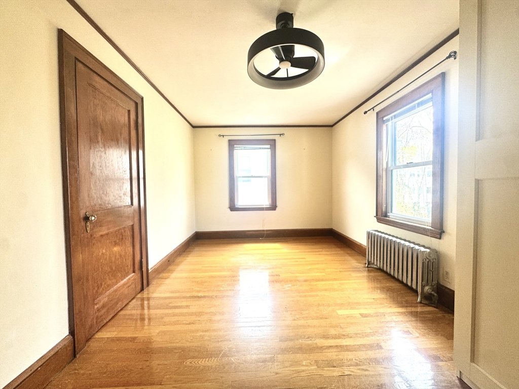 53 Breck Avenue Boston, MA 02135 - Photo 18 of 35 a view of an empty room with a window