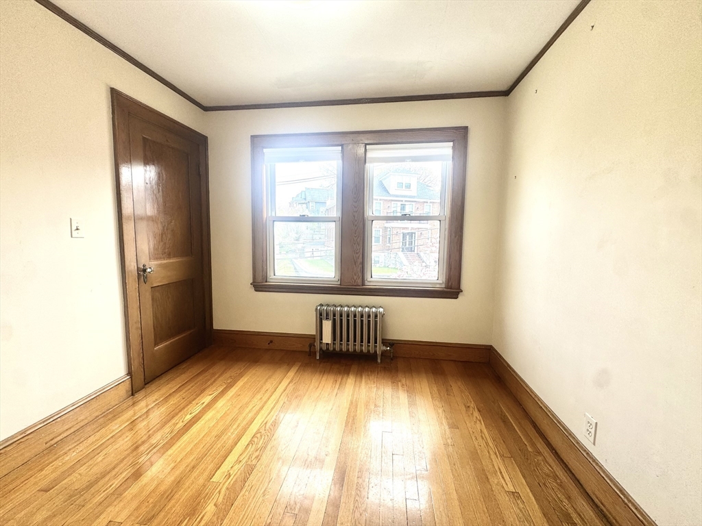 53 Breck Avenue Boston, MA 02135 - Photo 21 of 35 an empty room with a window